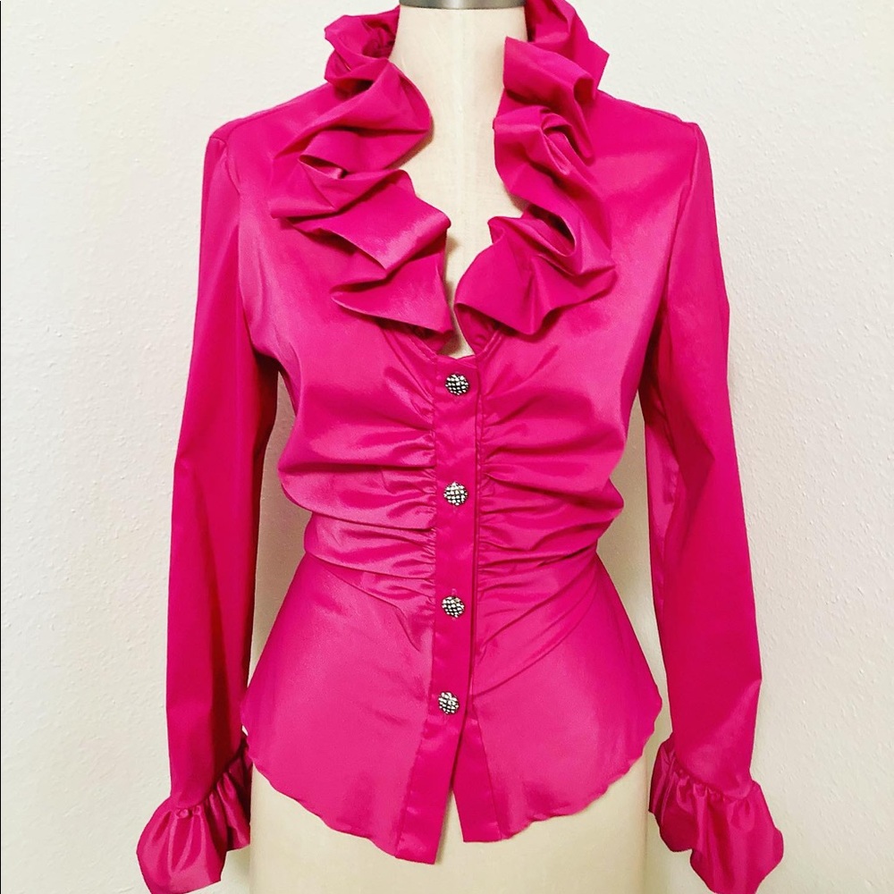 Ruffle Blouse around the color and sleeves.